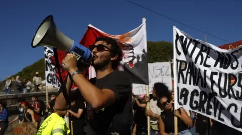 Countrywide Protests Break Out Against Spending Cuts