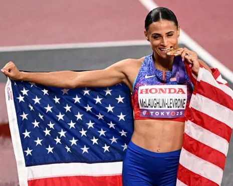 The American sprinter posts speediest female 400m in four decades to claim gold medal